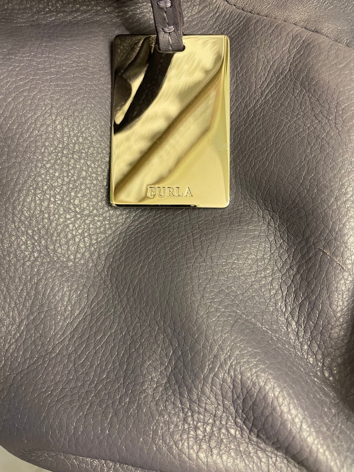 数々の賞を受賞 Leather 小物