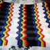 rainbow knitted blanket handmade hippy pride decor trippy