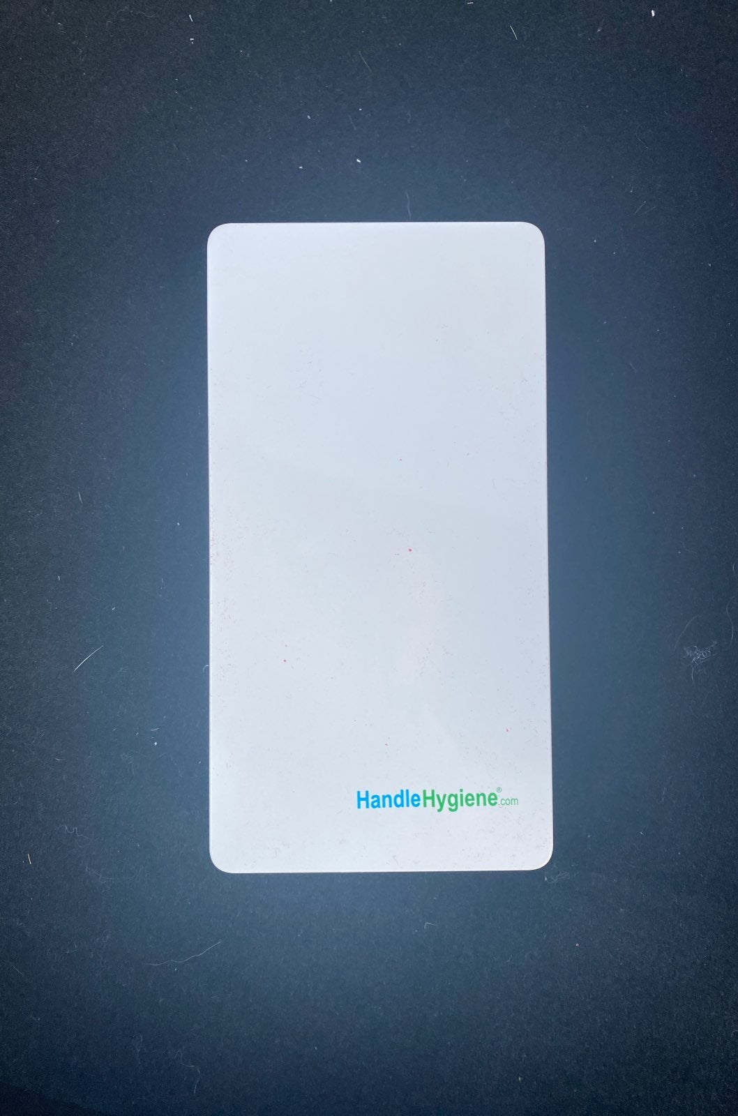 Automatic door handle sanitizer