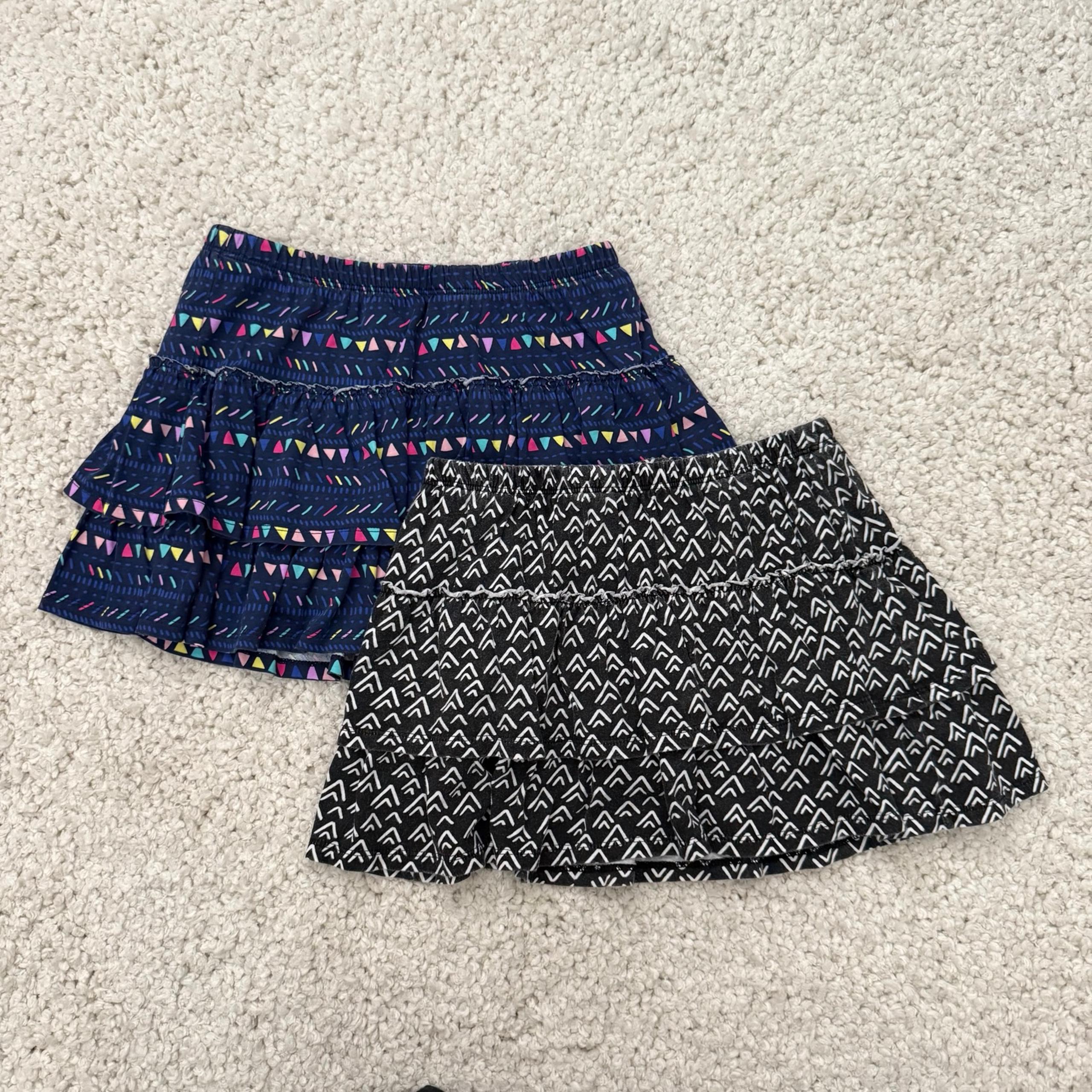 Two skirts for girls 10/12 with built in shorts