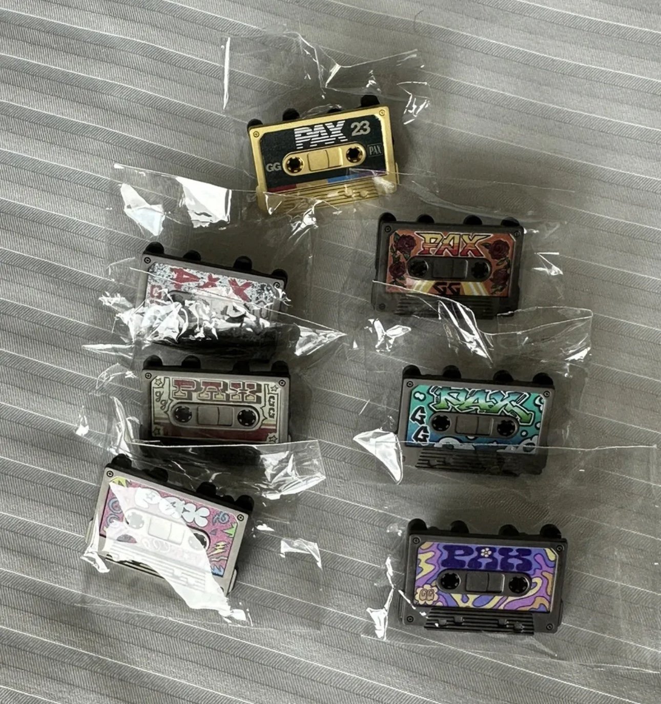 Pinny Arcade PAX East 2023 Full Set of Casette Tape Pins Gold Staff Mixtape
