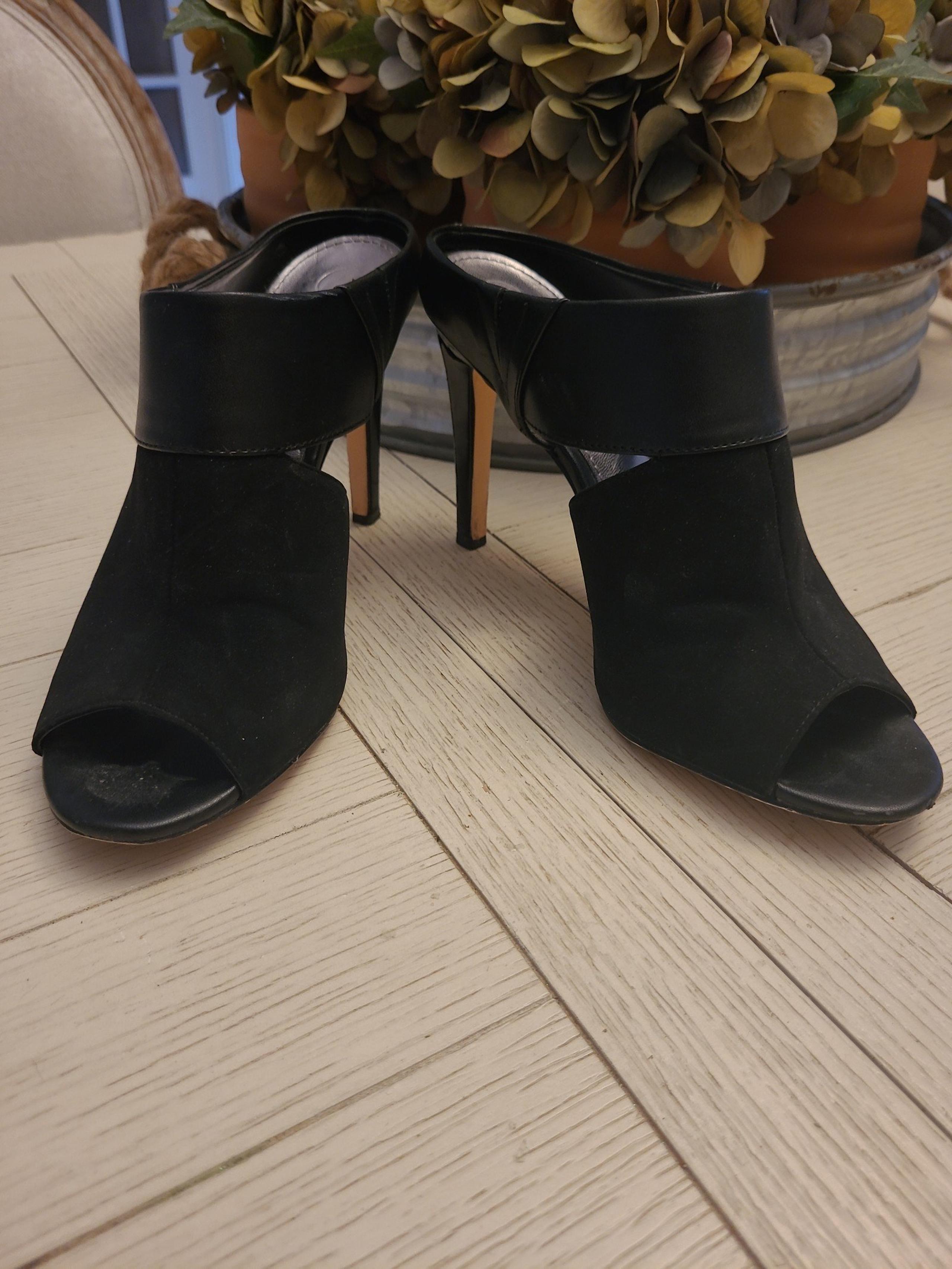 Black Calvin Klein. Peep toe. 8.5.