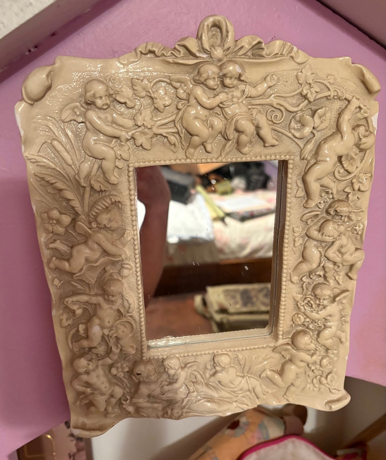 Vintage cherub mirror