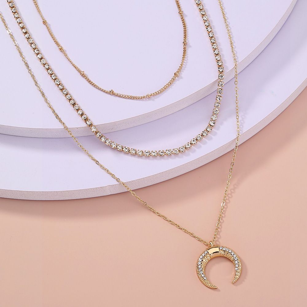 Europe and the United States burst of jewelry retro moon cow horn pendant multi-