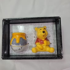 Winnie-the-Pooh & pot salt and pepper shaker.
