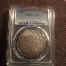 1922 PEACE DOLLAR AU50 PCGS