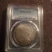 1922 PEACE DOLLAR AU50 PCGS