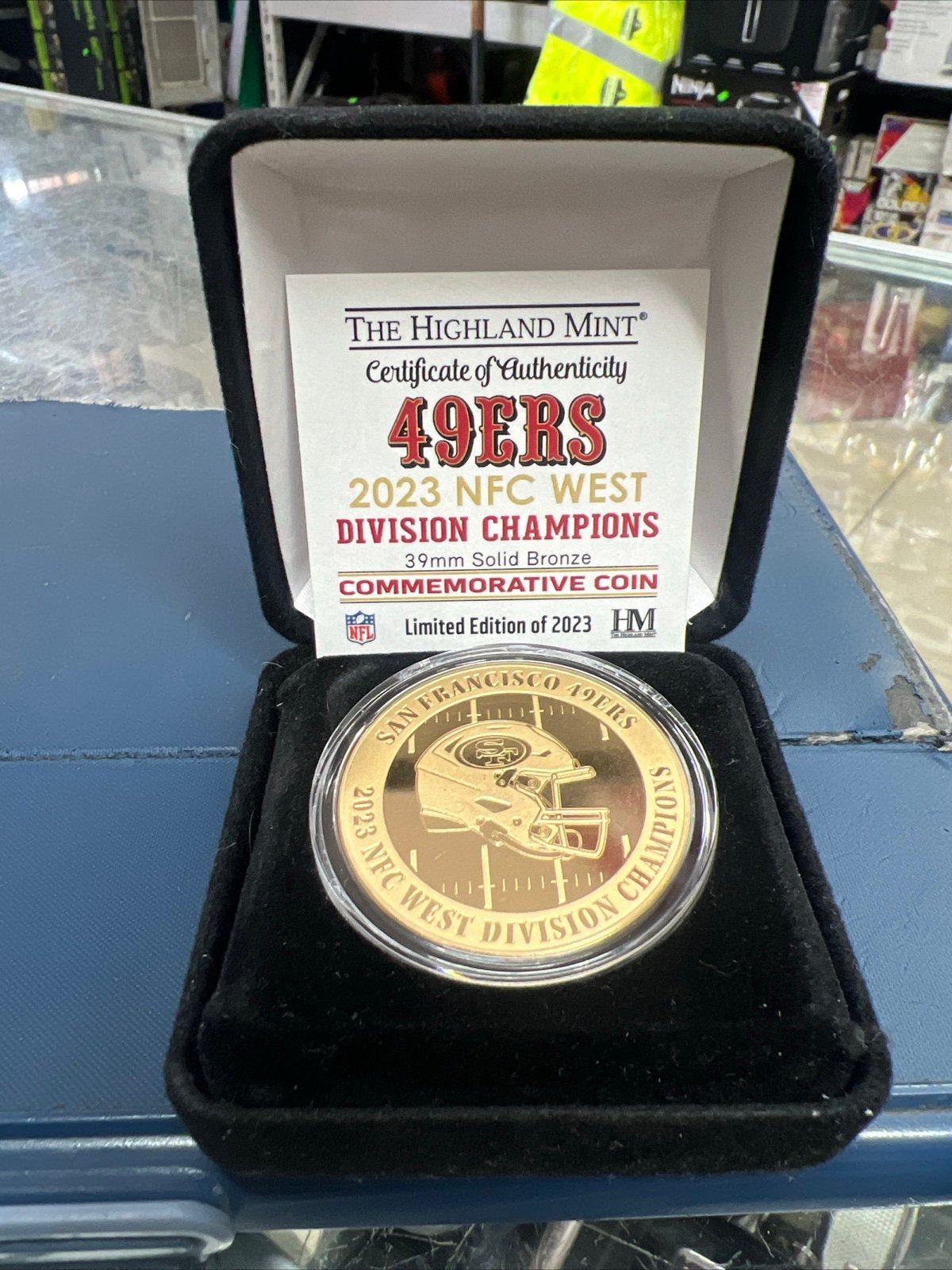 The Highland Mint 2023 San Francisco 49ers NFC West Champions Bronze Coin
