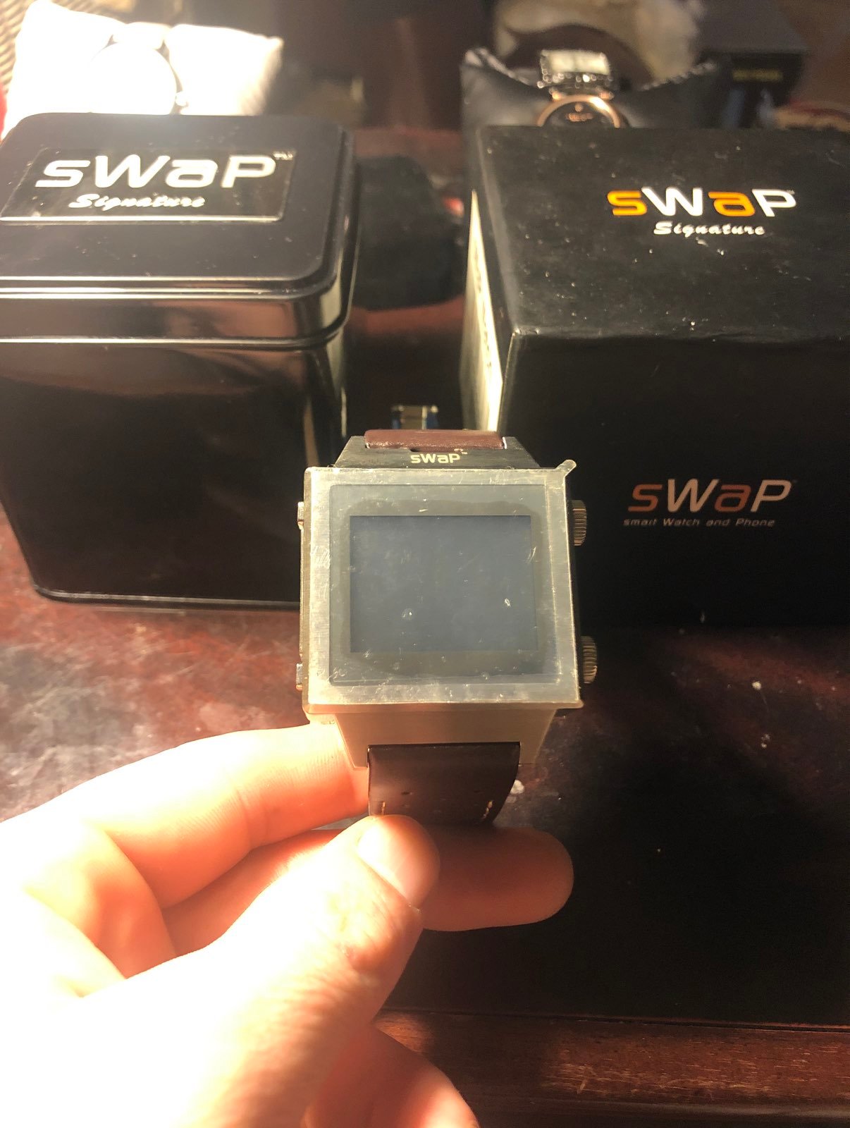 Swap signature watches mobile phone