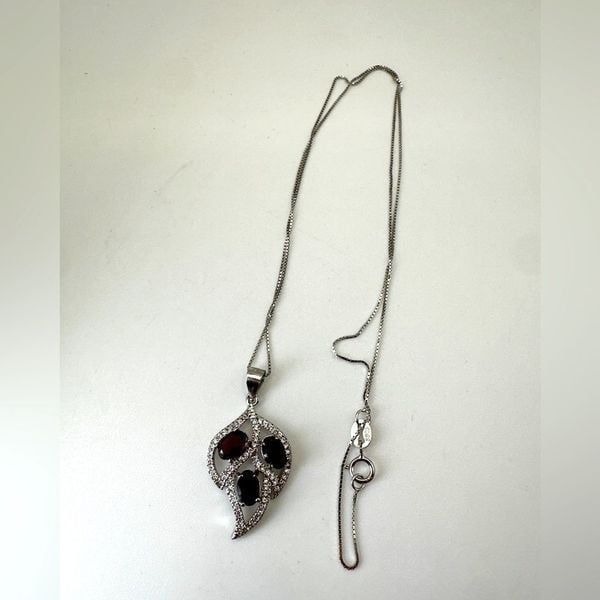 Three rhodalite garnets with cz accents leaf pendant on 17 925 necklace!