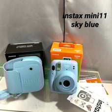 Excellent condition instax mini11 sky blue instant camera with case.