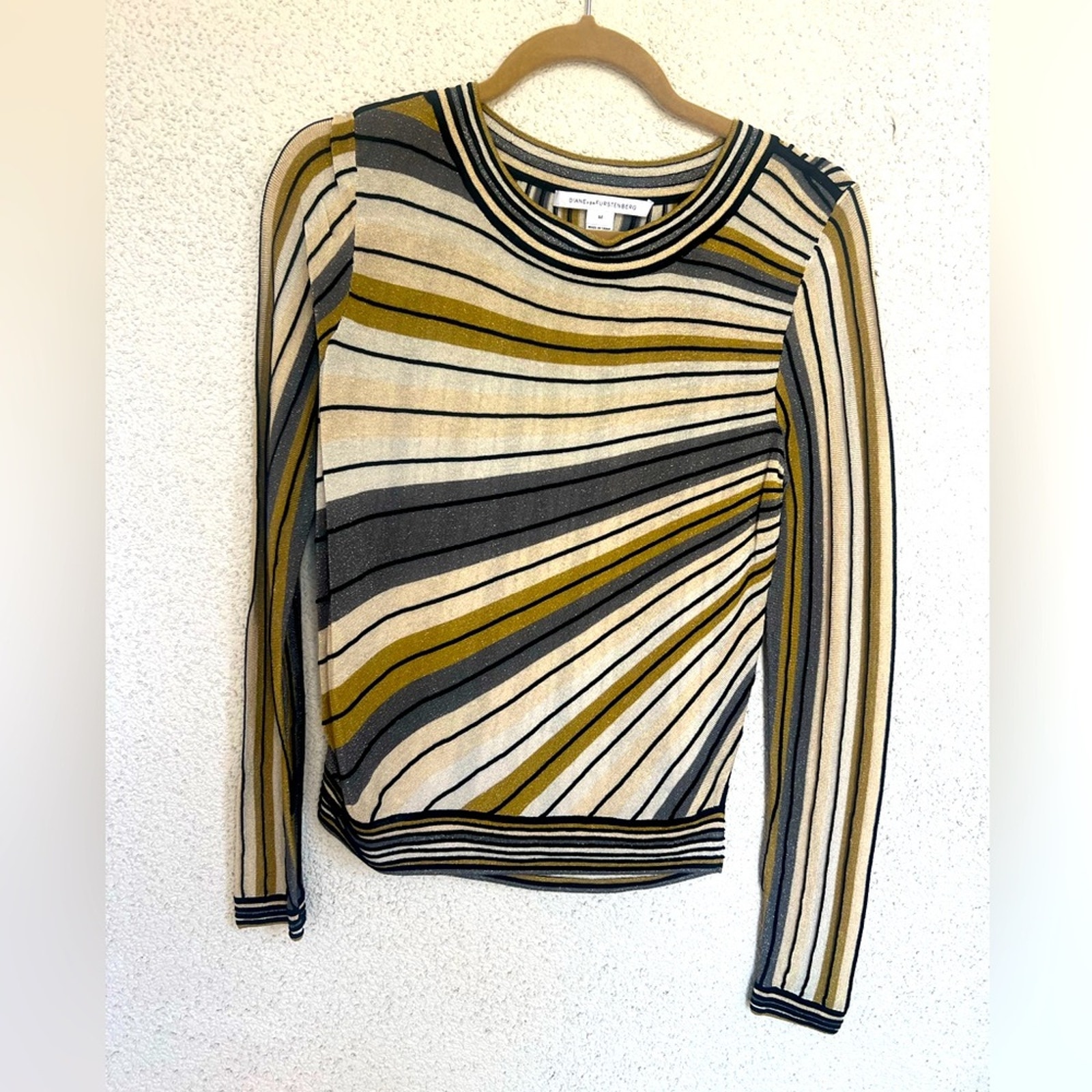EUC Diane Von Furstenberg creams/gold/silver/black asymmetrical striped shirt M
