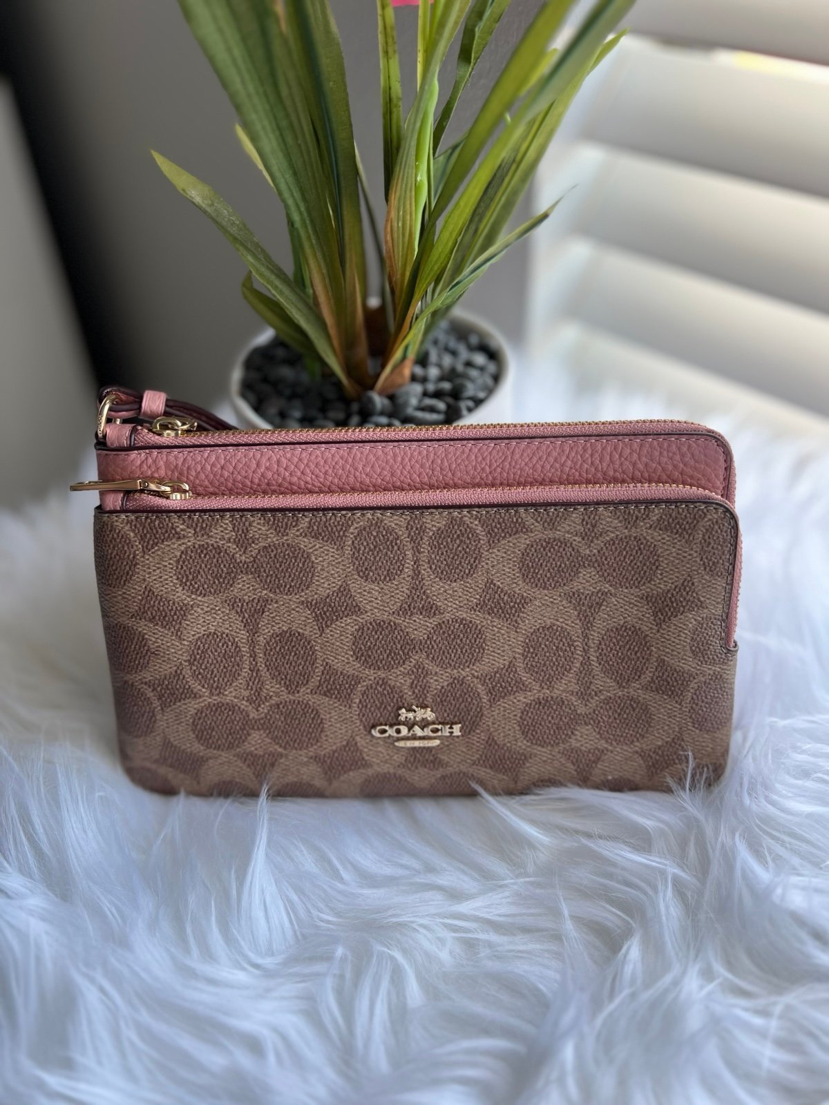 Coach double zip wallet in petal pink signature