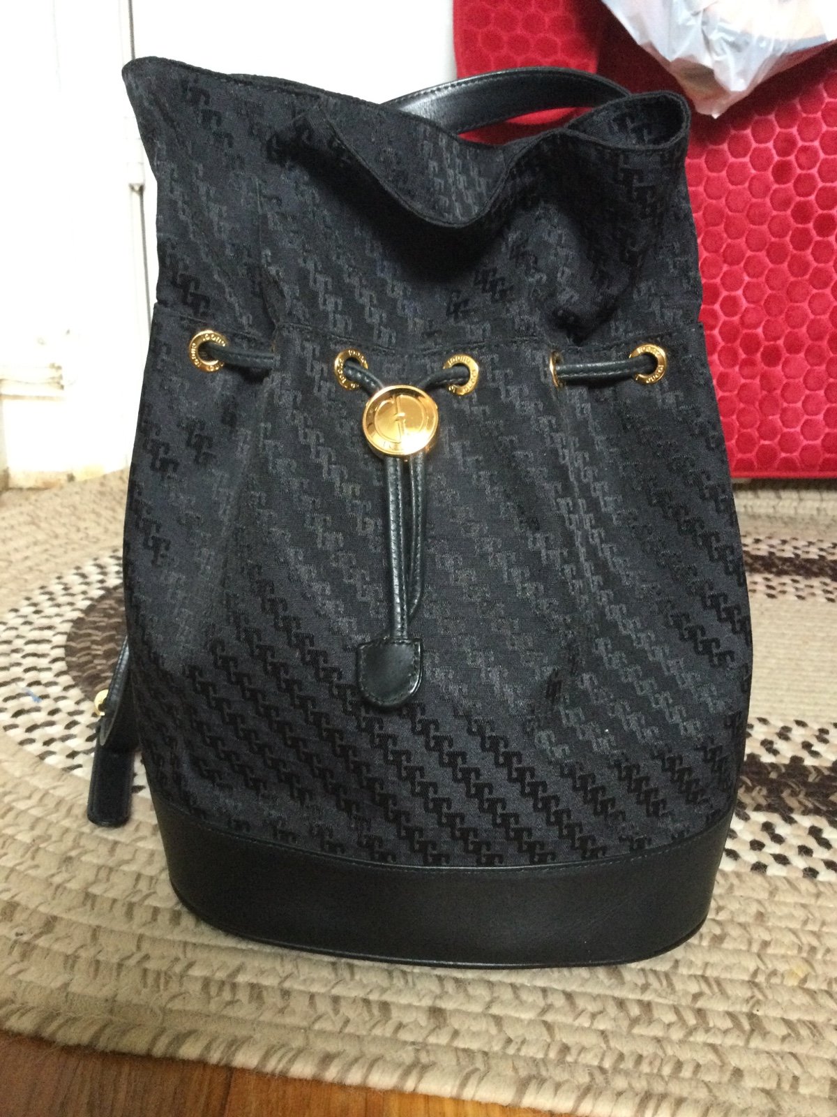 Gucci black bucket bags w/COA