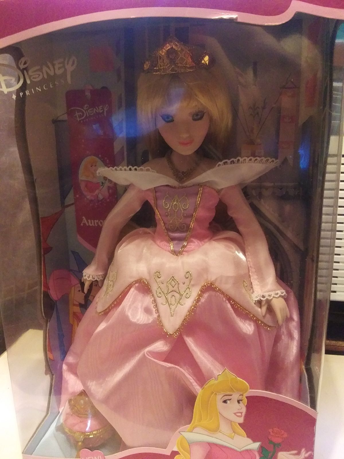 Aurora porcelain keepsake doll. New in b