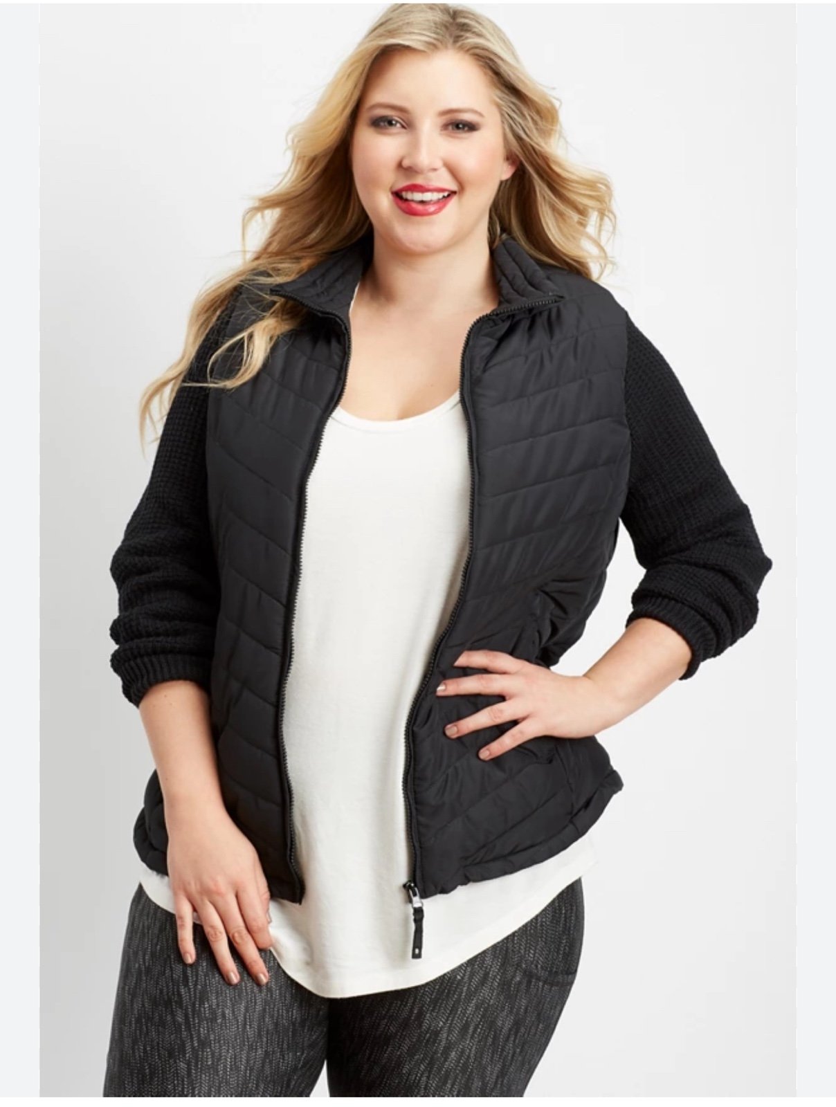 Women’s plus size sweater sleeve puffer jacket by Maurice’s. Size 2. Black