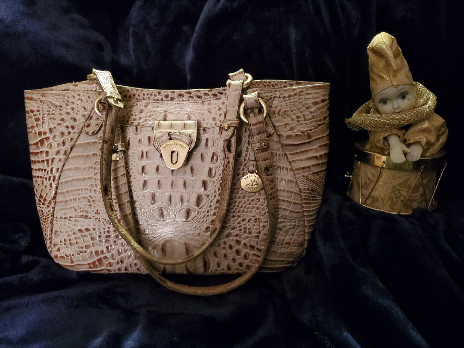 Brahmin handbags in a Taupe/ Beige color