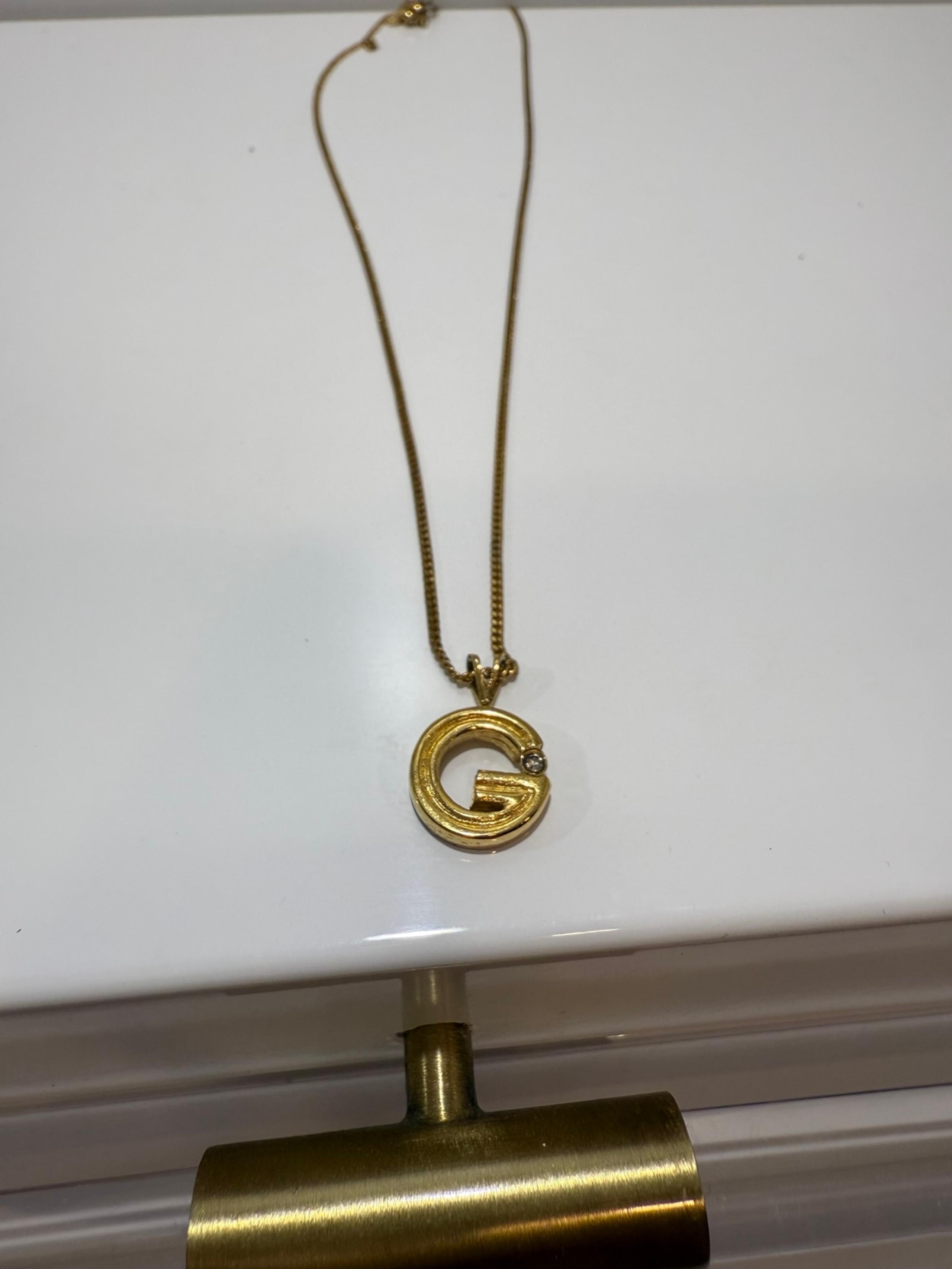 Givenchy gold letter necklace