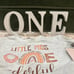 One letters, one cake topper, high chair decor and onsie (onsie never worn)