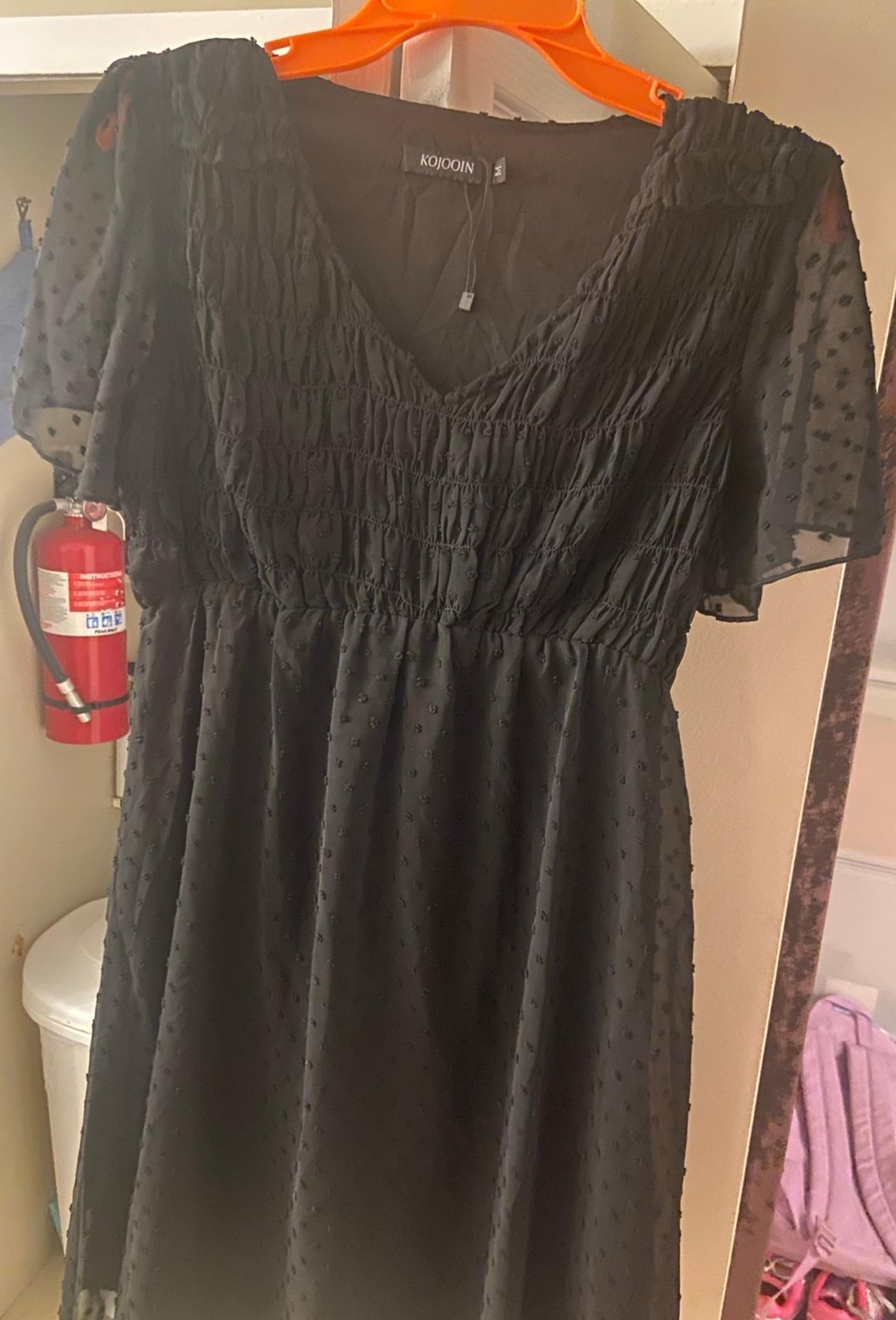 Black dress size medium, mini dress (brand new with tags) short sleeve very cute