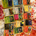 Pokémon Card Lot Of 75 Mixed Series, 2 Coins, And The Card Holding Binder