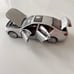 silver 1:18 scale model of a BMW 5 Series 550i (F10) By Norev