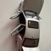 silver 1:18 scale model of a BMW 5 Series 550i (F10) By Norev
