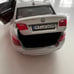 silver 1:18 scale model of a BMW 5 Series 550i (F10) By Norev