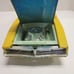 Vintage and RARE Ertl diecast friction toy car called The Stinger which is a 196