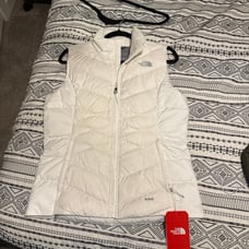 The North Face women’s white 550 puffer vest