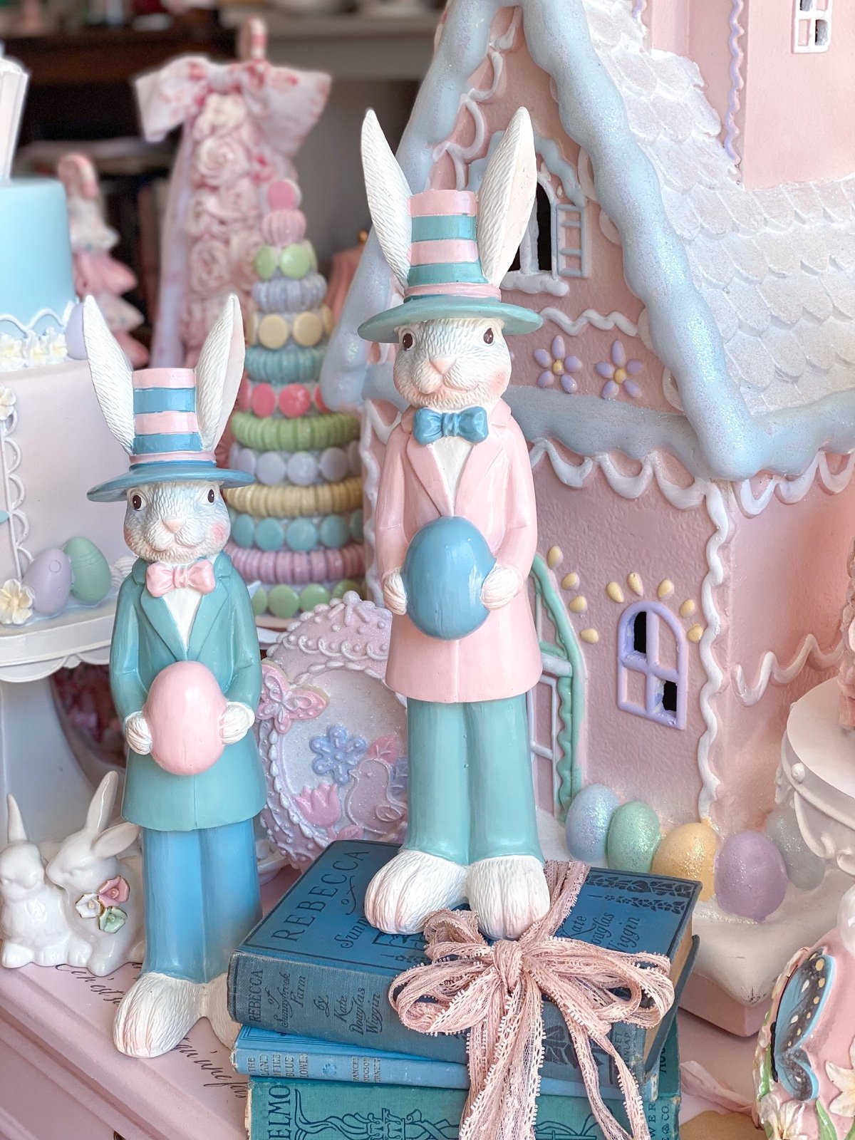 Set of 2 Pastel Pink and Blue Nutcracker Style Bunnies holding Easter eggs