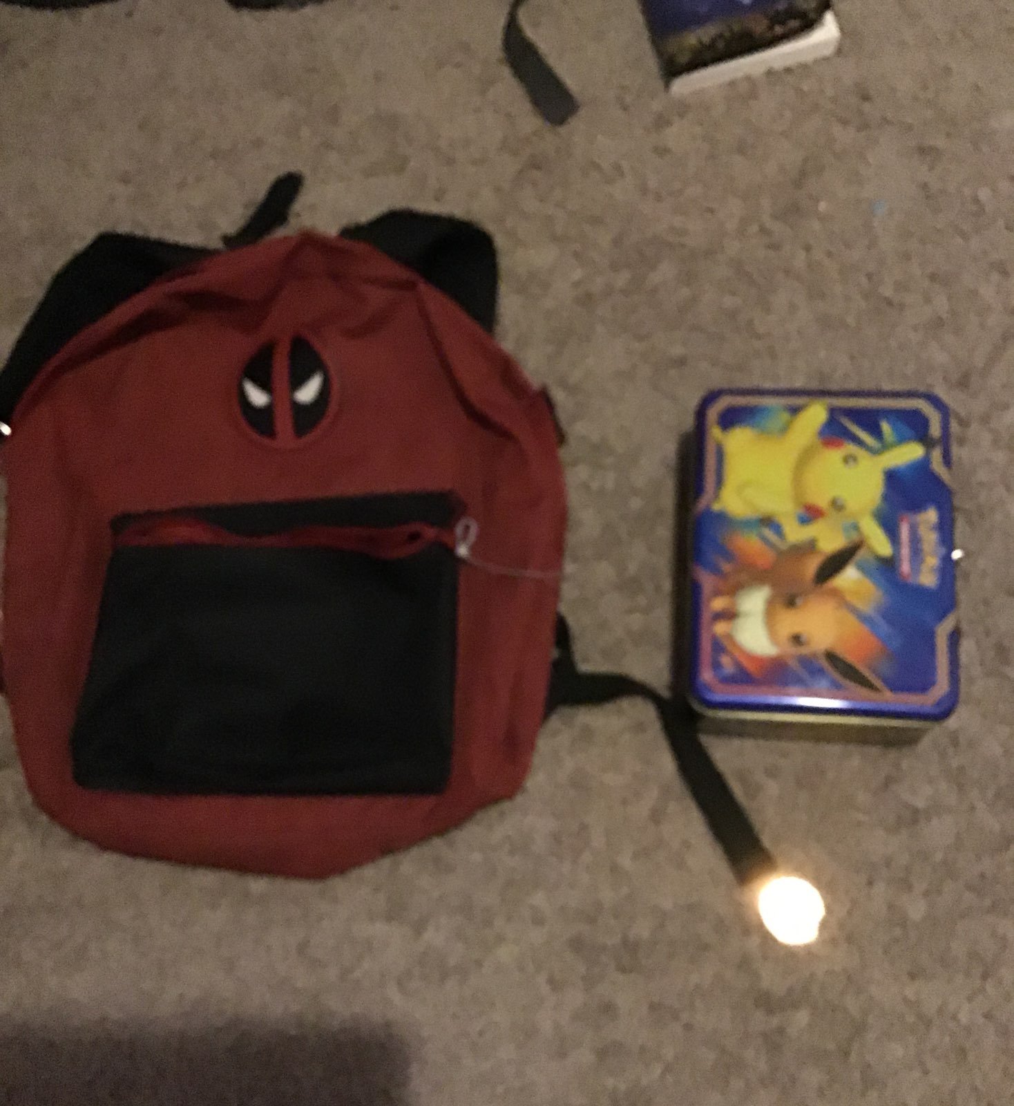 backpack and pokemon cards