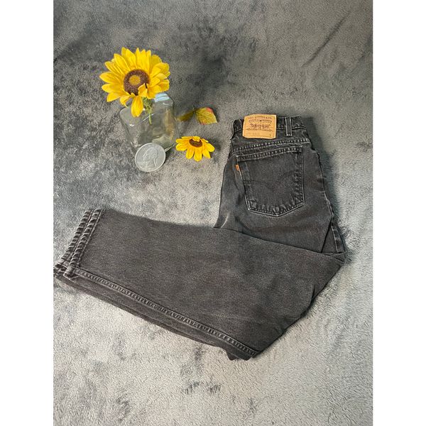 VTG women’s Levi’s 951 Relaxed Fit Orange tag