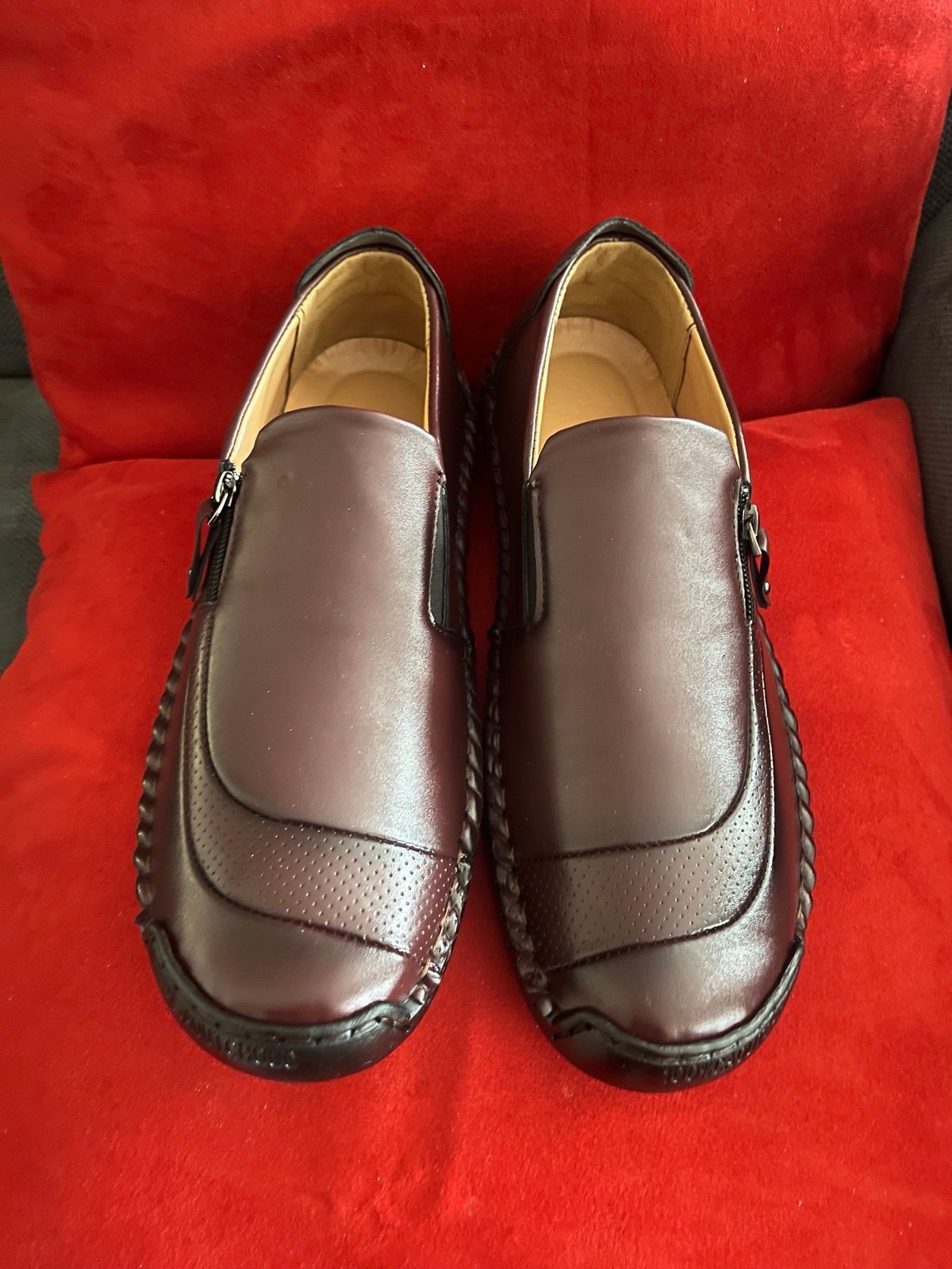 Men’s Shoes Size 11 1/2 Color is Brown with side zipper and black sole.