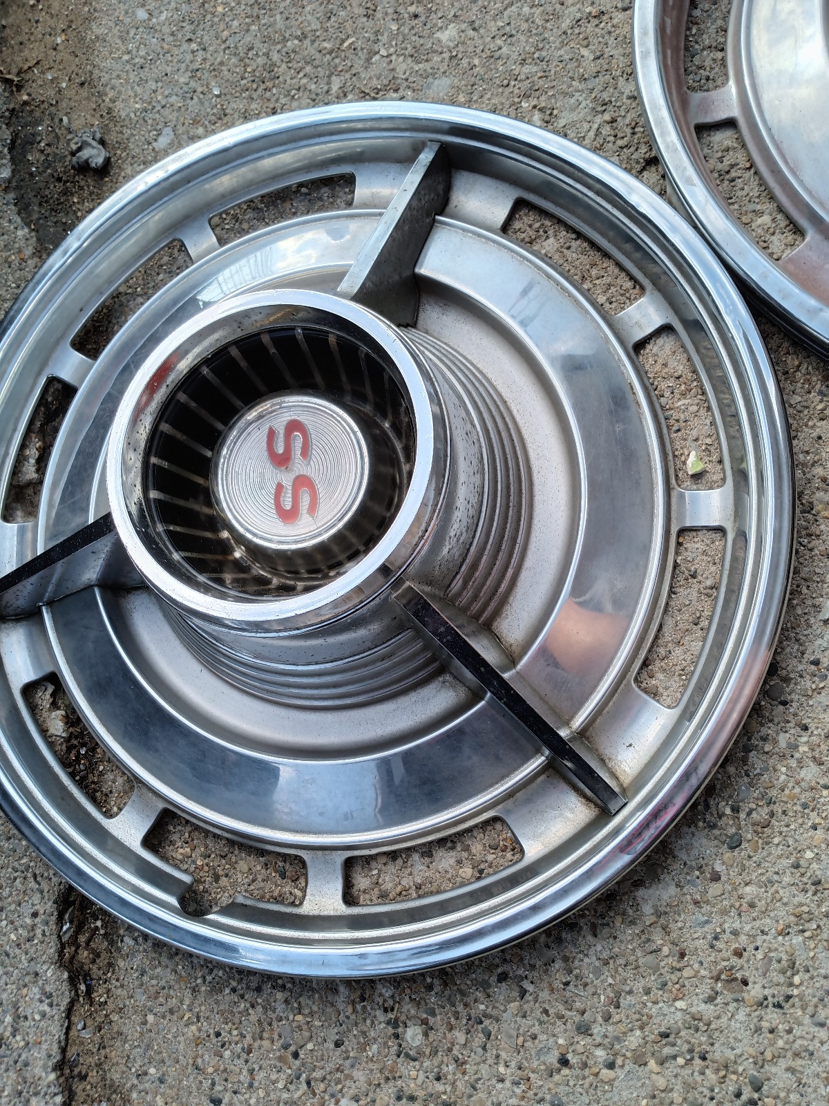 5-14 Chevy SS spinner hubcaps