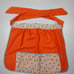 Vintage 80s hello kitty pin up vibes gardening floral bright orange apron skirt