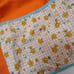 Vintage 80s hello kitty pin up vibes gardening floral bright orange apron skirt