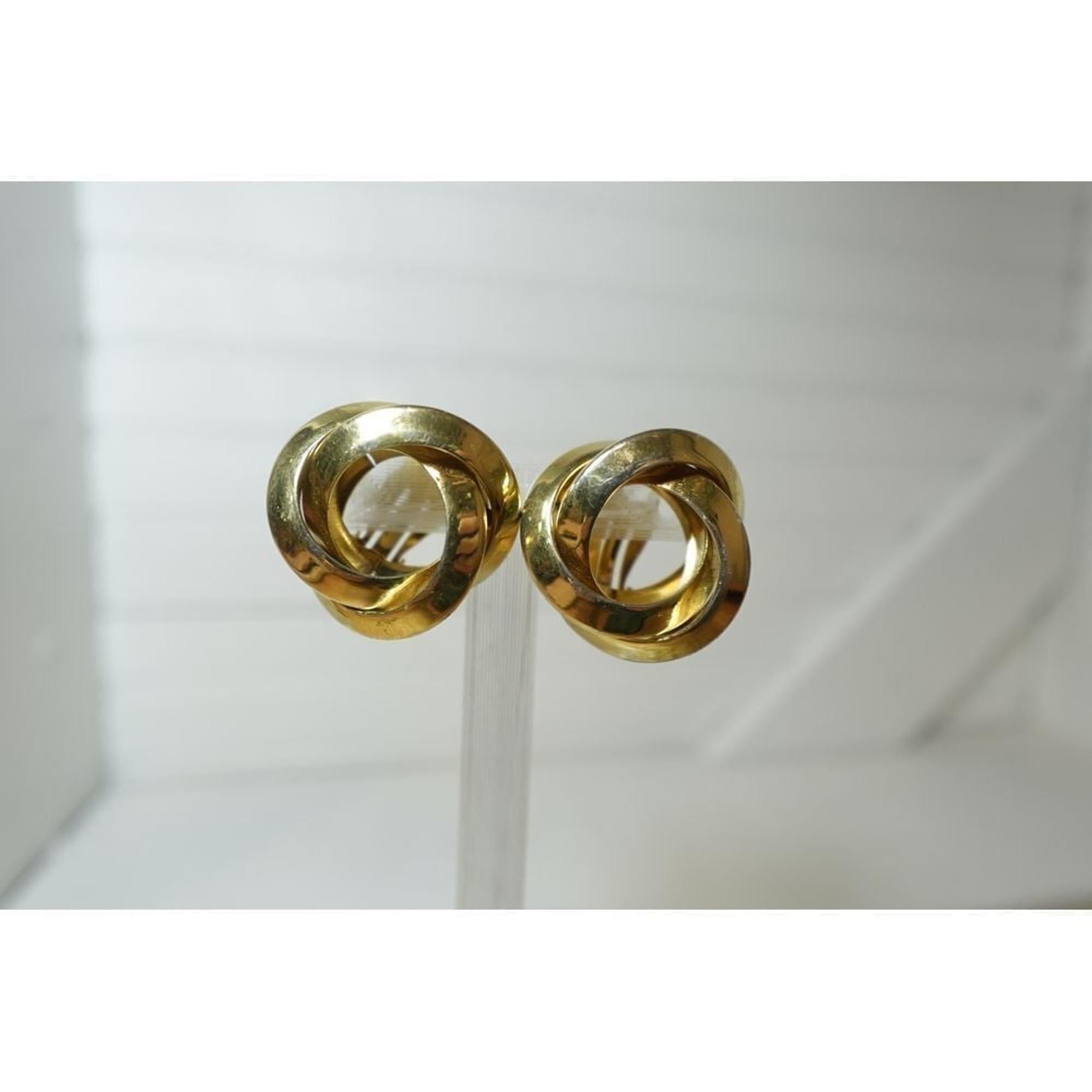 Vintage gold toned Givenchy clip on spiral earrings Designer Retro Glam