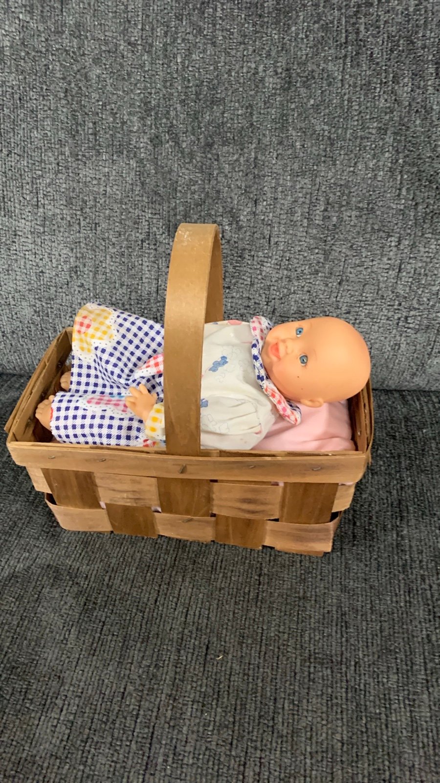 Vintage Baby Doll in Basket. In great condition- has some wear. SU
