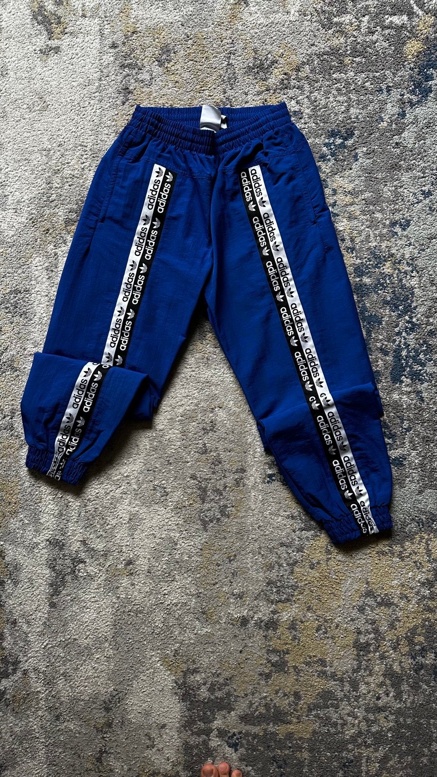 Track pants by Adidas