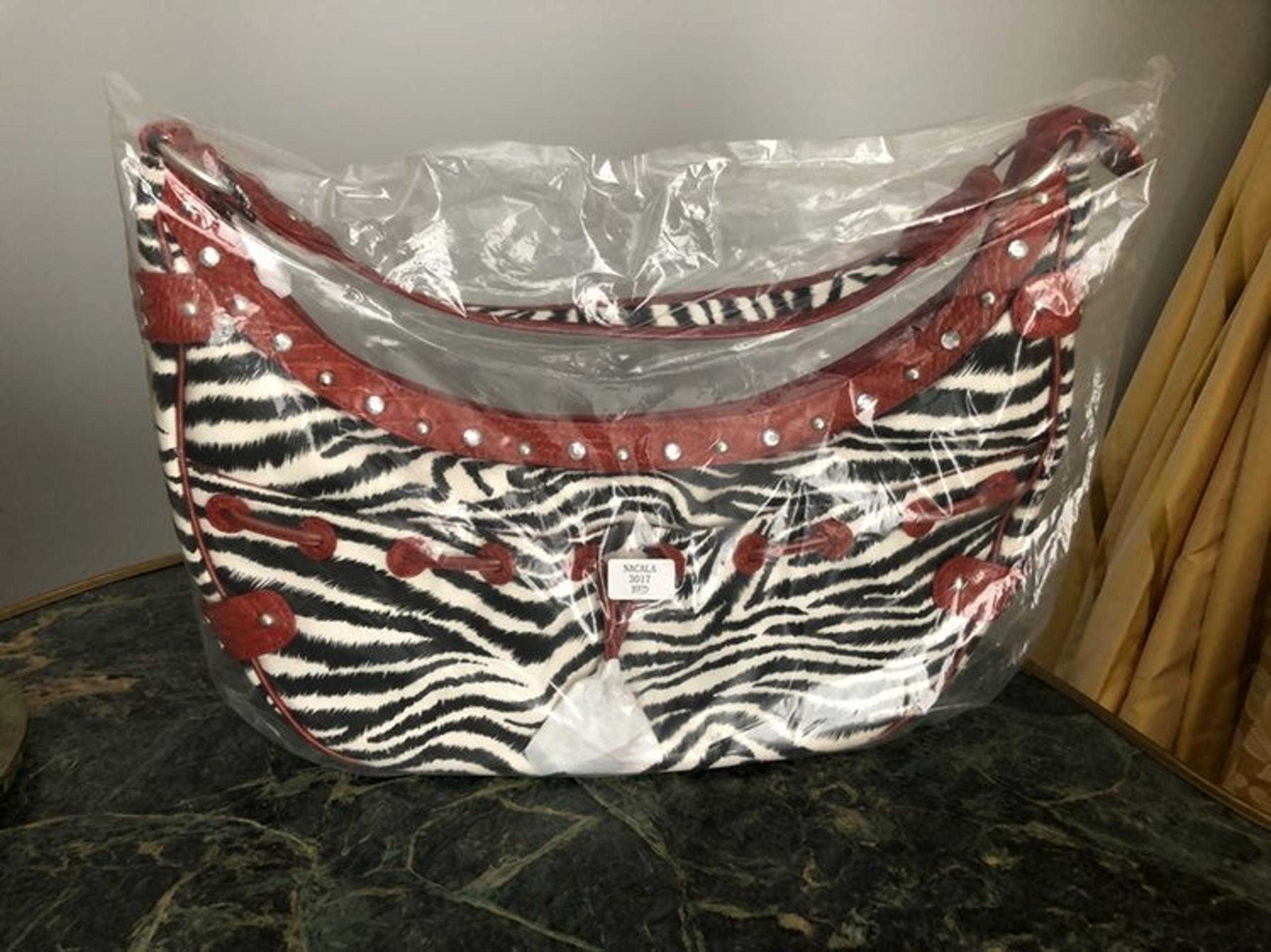 Zebra print w/redleather trim handbag