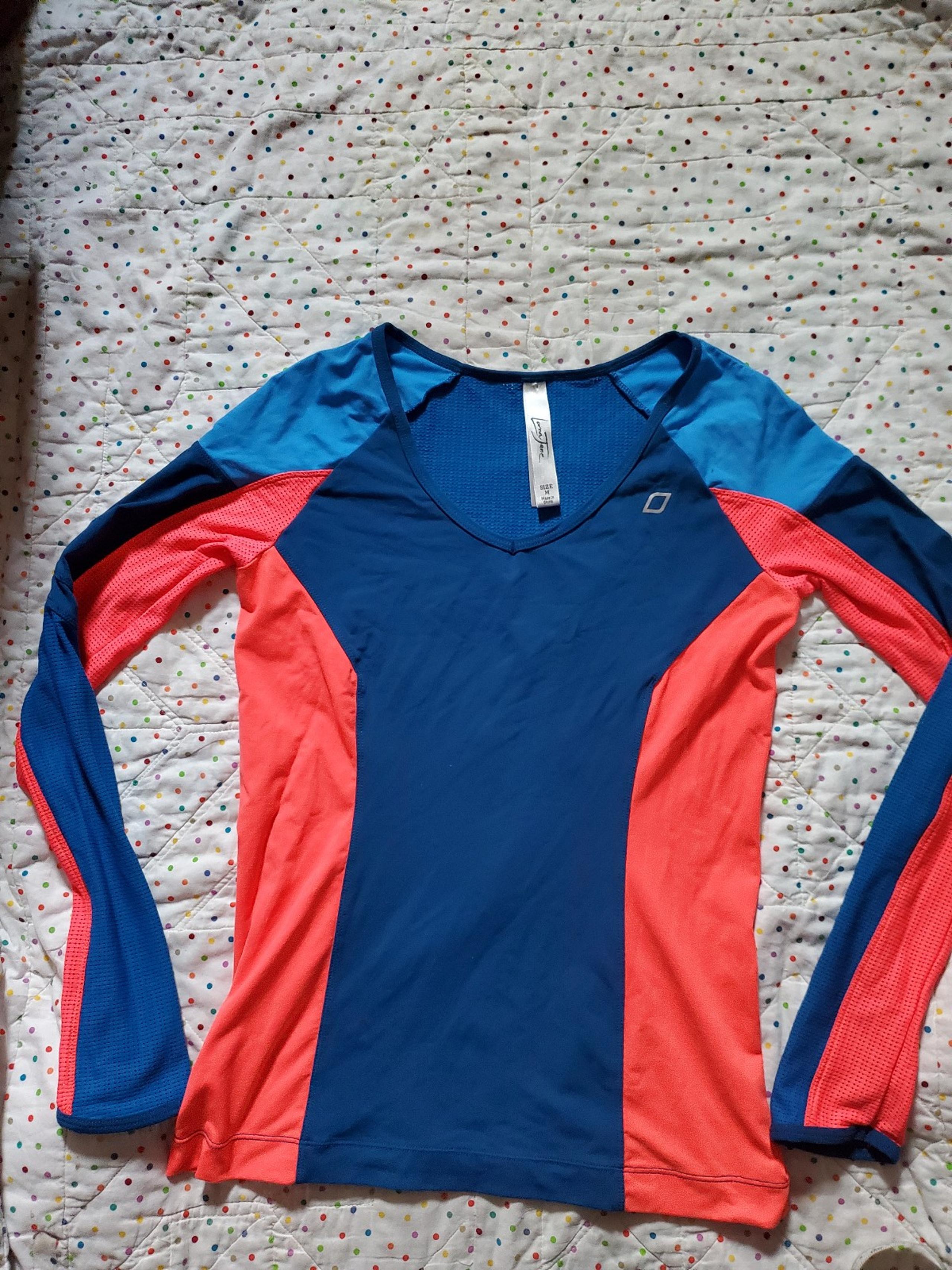 Lorna Jane women's athletic long sleeve top size Medium.