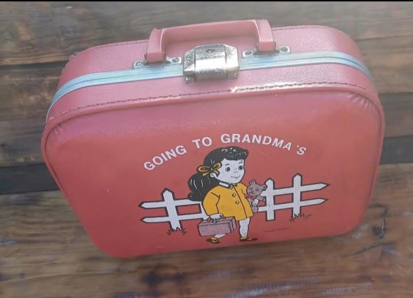 Vintage small red children's suitcase circa 70's 80's going to grandma's