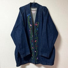 Vintage floral embroidered denim jacket purchased from a thrift store.