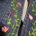 Vintage floral embroidered denim jacket purchased from a thrift store.