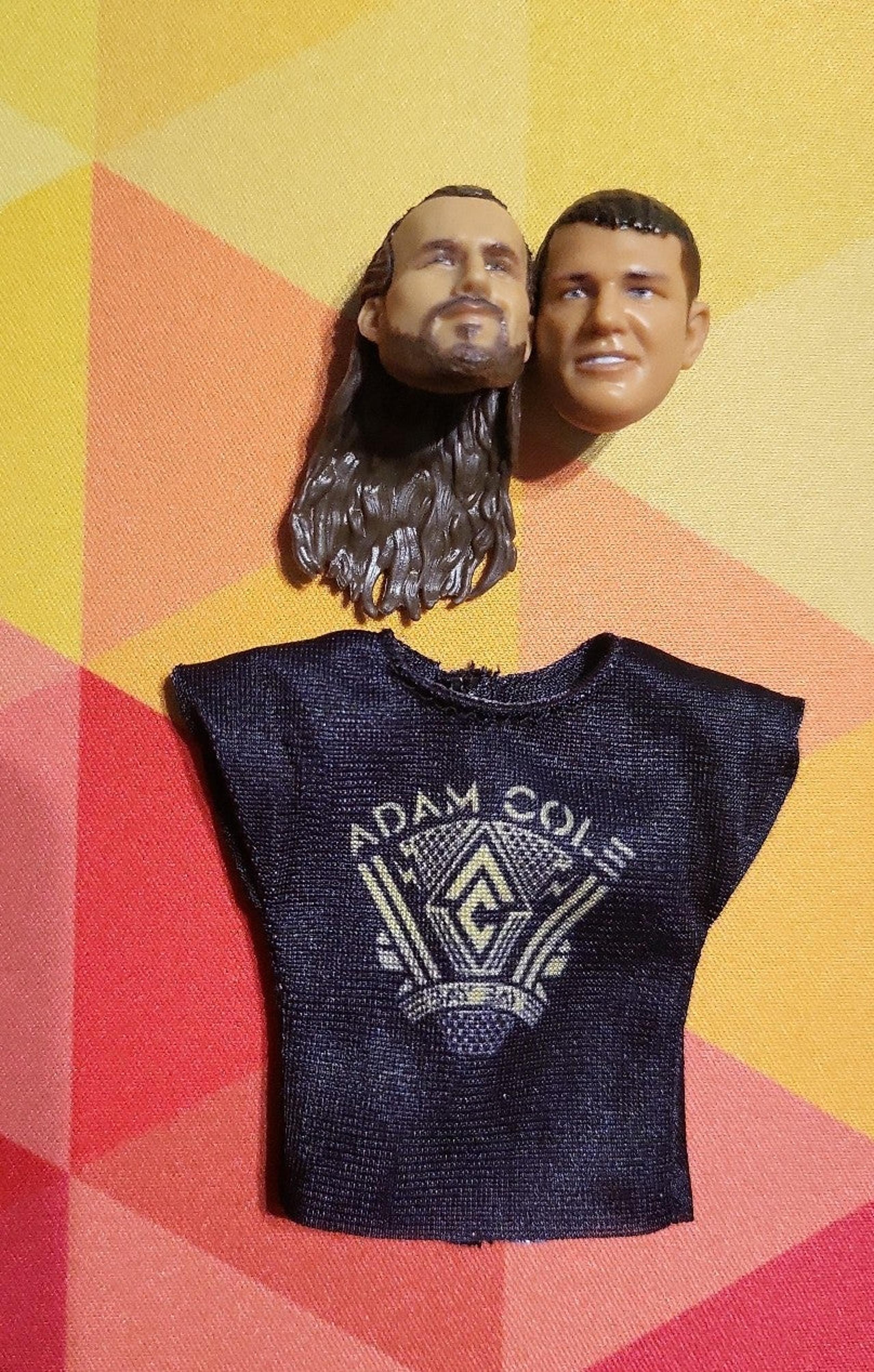Adam Cole elite 92 head and shirt & AJ Styles head - WWE
