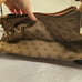 Dooney & Bourke Signature Canvas East West Slouch Shoulder Purse Used Condition.