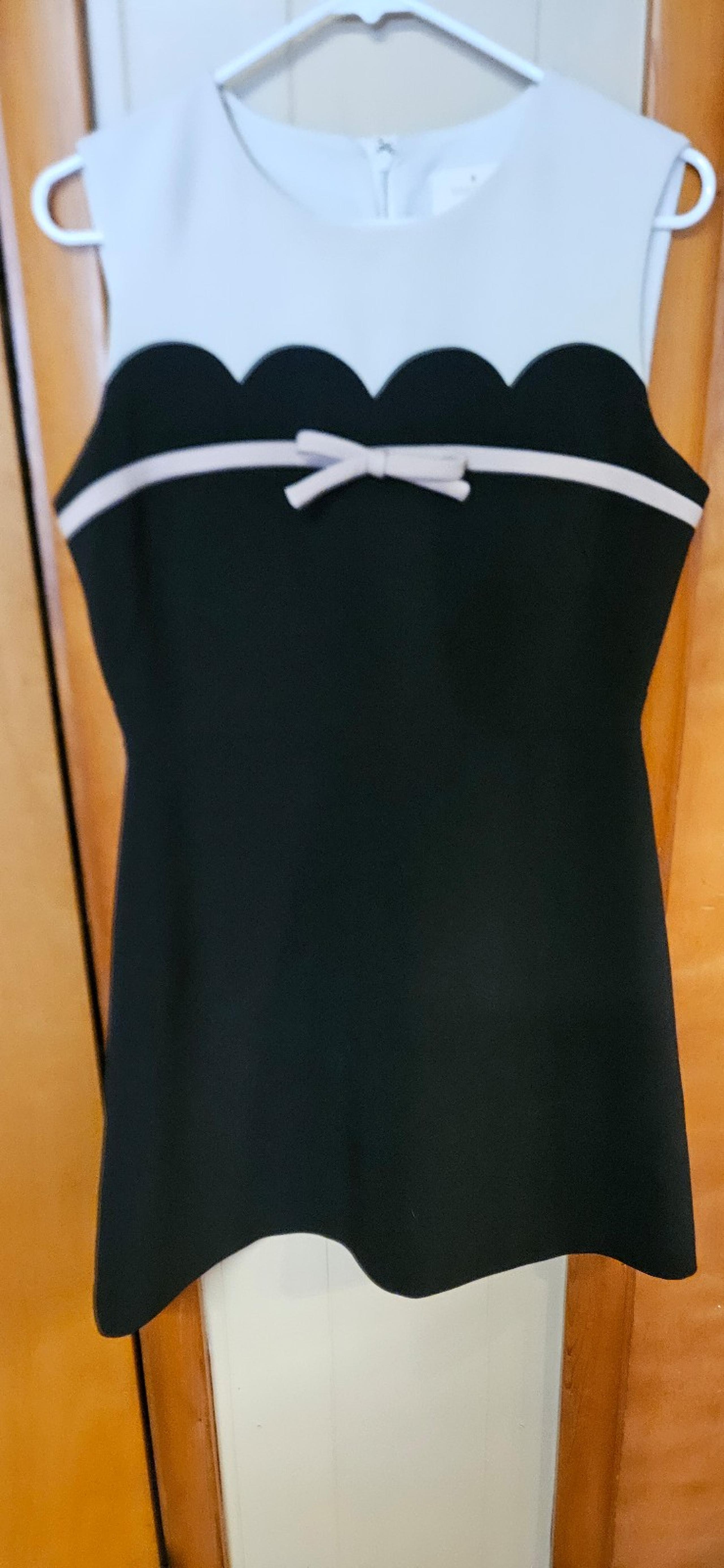 Kate Spade black pink and cream with pink bow sz 8