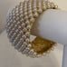 Beautiful Pearl Wide Cuff Bracelet in Gold Tone for any occasion