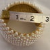 Beautiful Pearl Wide Cuff Bracelet in Gold Tone for any occasion